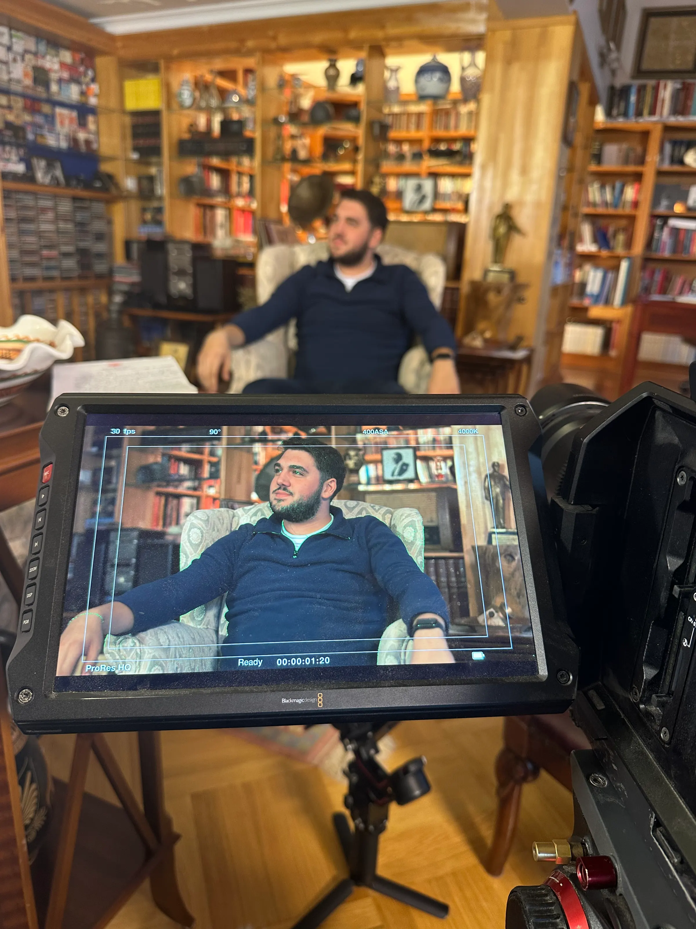 A conversation piece filmed in a library setting